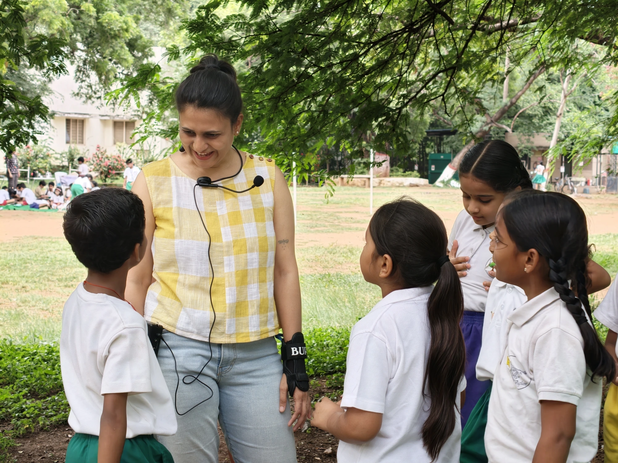 Rucha with students during an outdoor session